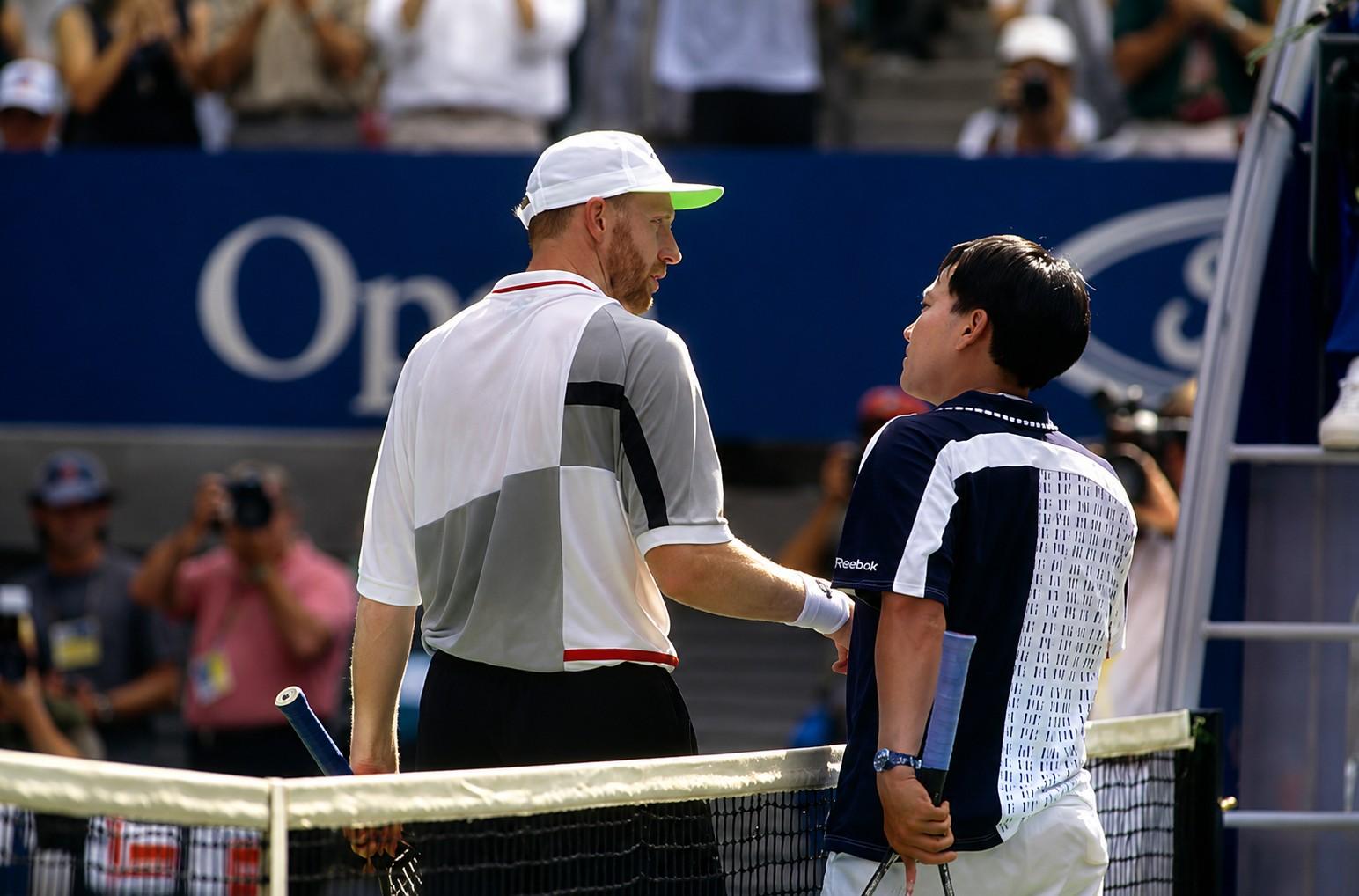 Boris Becker et Michael Chang à l'Open d'Australie 1996