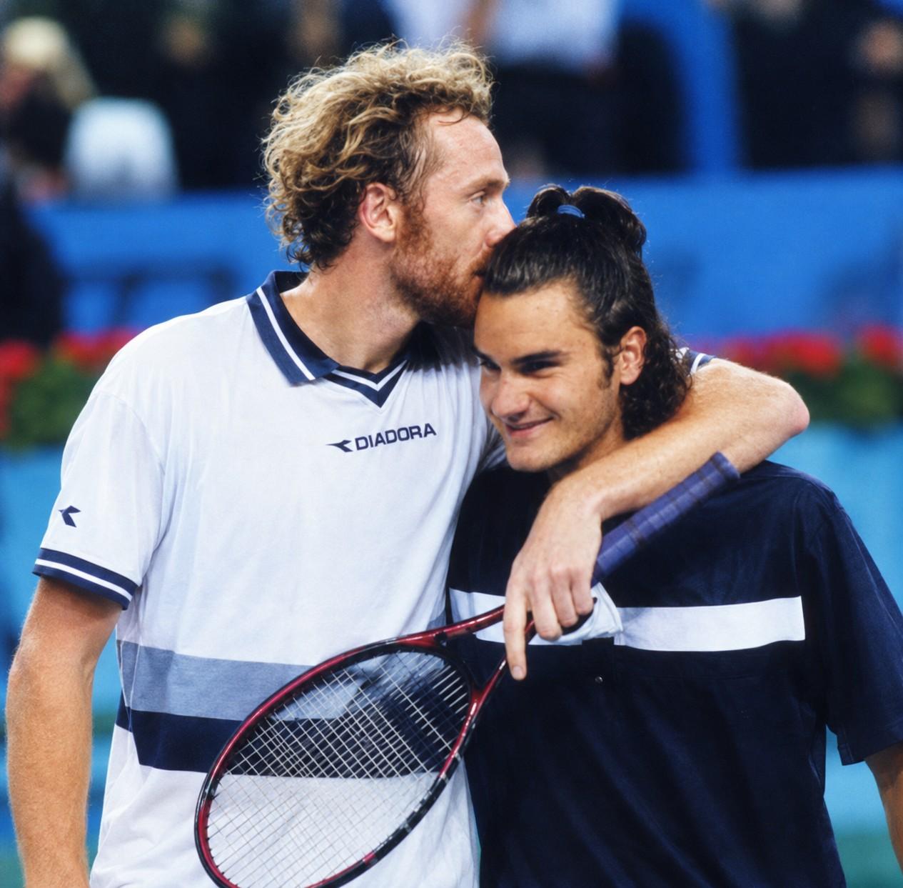 Marc Rosset et Roger Federer après la finale de Marseille en 2000