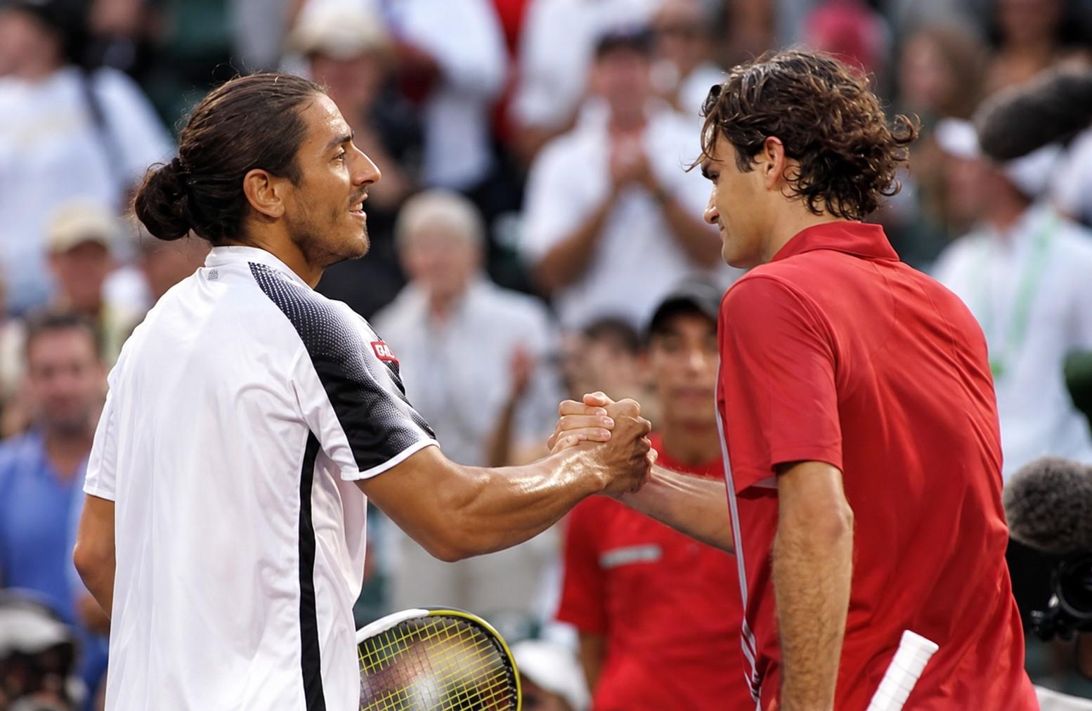 Guillermo Cañas et Roger Federer après leur match de Miami en 2007
