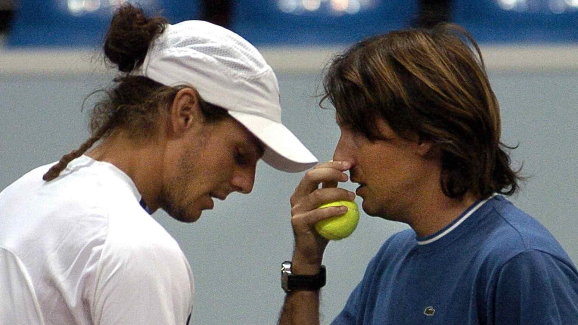 Gaston Gaudio échangeant avec Franco Davin